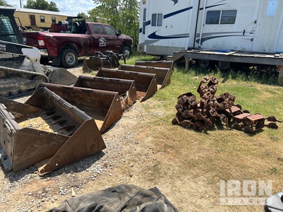 Quantity of (7) Skid Steer Buckets & (2) Over The Tire Tracks