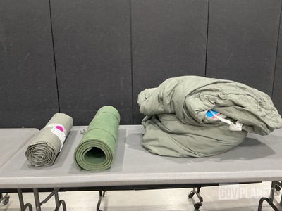 (67) Sleeping Mats, (7) Sleeping Bags & Assorted Items