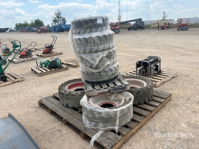 Quantity of (8) Mixed Skid Steer Wheels Tires
