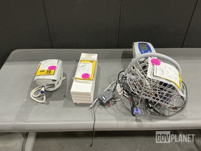 (2) Vital Sign Patient Monitors, (4) FlipCutter Cutting Spikes & Assorted Items