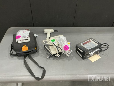 (2) Ammeters, (1) Curing Light System, (2) Defibrillators & Assorted Items