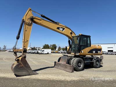 Cat M318D Wiel graafmachine