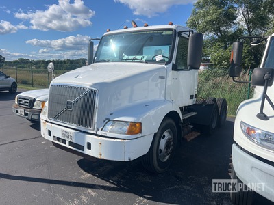 2002 Volvo VNM64T 6x4 T/A Day Cab Truck Tractor