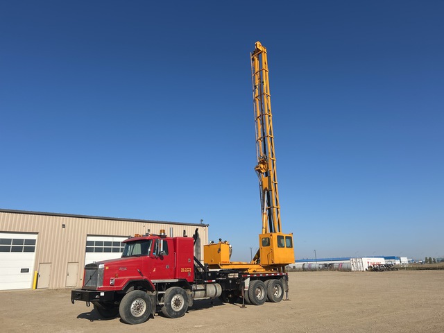 OK Drilling Services Hydraulic Pile Hammer on 1998 Volvo 8x4 Twin-Steer Truck OK Drilling Services Hydraulic Pile Hammer on 1998 Volvo 8x4 Twin-Steer Truck