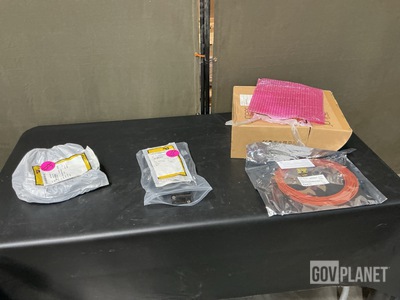(1) Optical Cable, (5) Battery Holders, (1) Wiring Harness & Assorted Items