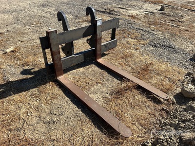 Cat 54 in Backhoe Forks