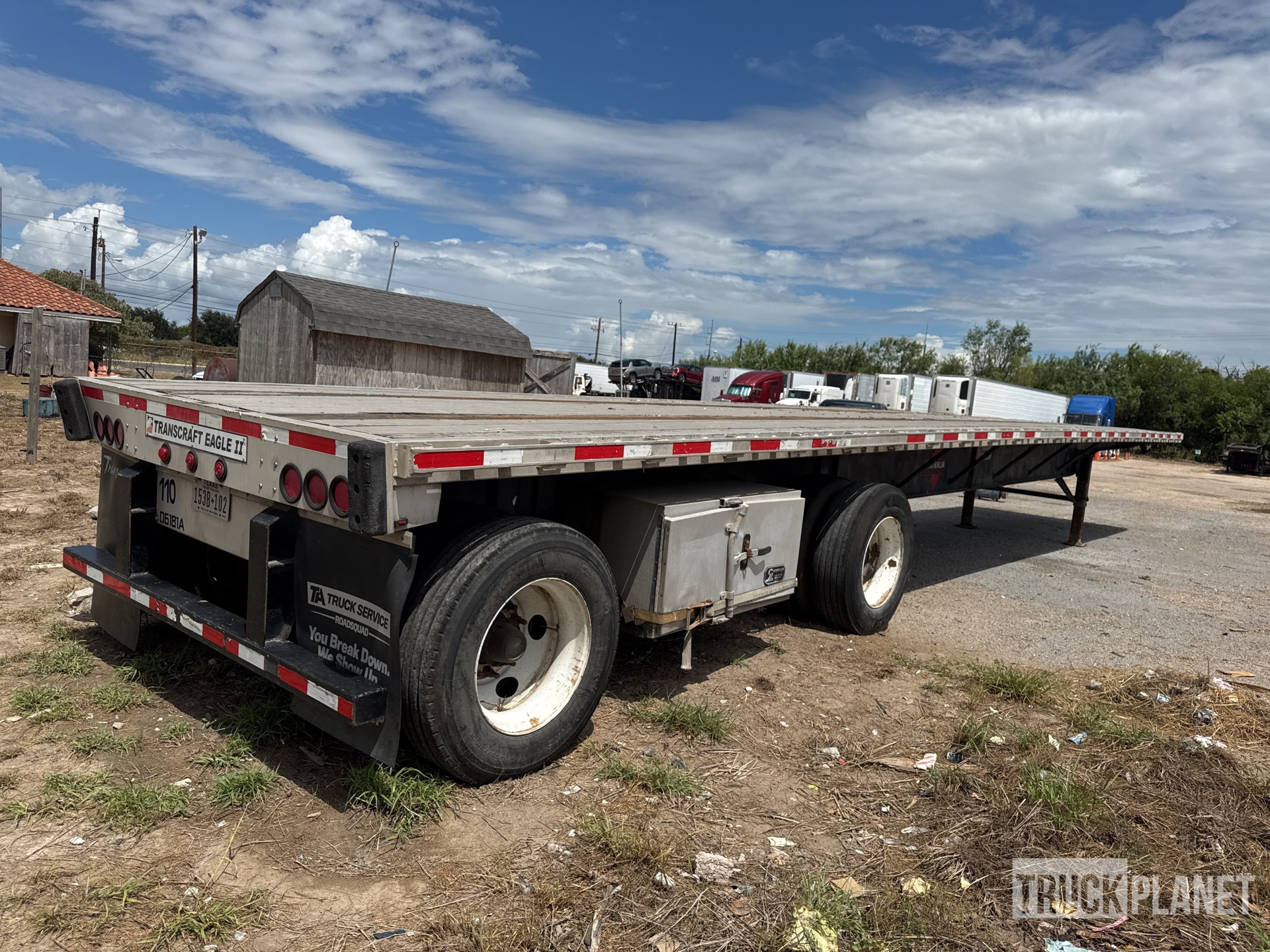 2016 Transcraft 80000 lb 48 ft T/A Spread Axle Flatbed Trailer in
