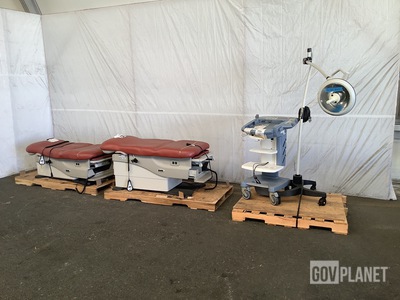 (1) Surgical Light, (1) GE VOLUSON Station & (2) Midmark Examination Tables