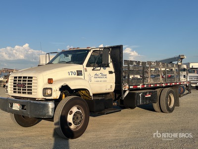 2002 GMC C7500 4x2 شاحنة مسطحة