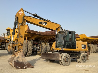 2012 Cat M318D حفارة بعجلات