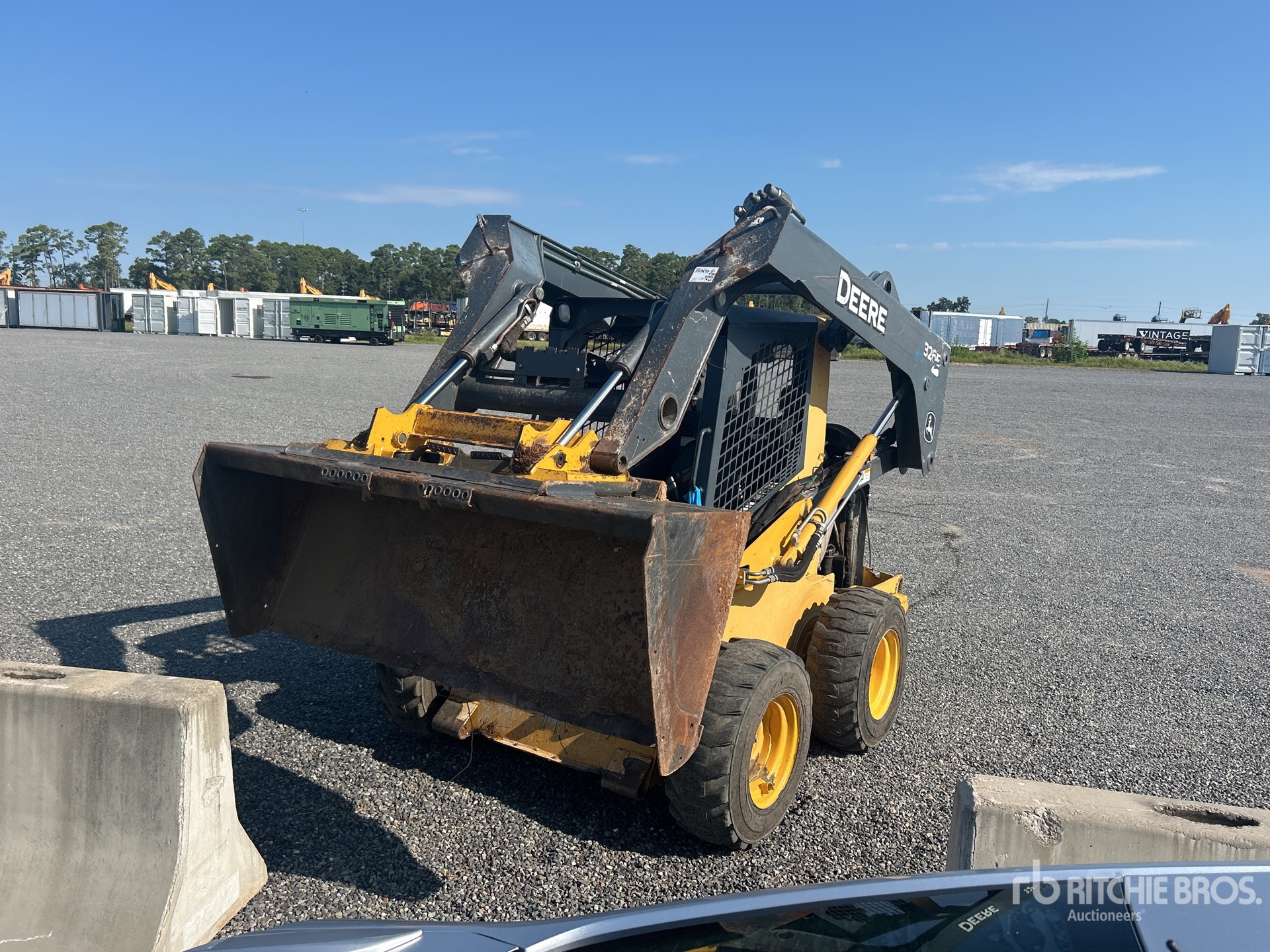 2014 John Deere 326E Chargeuse à direction à glissement