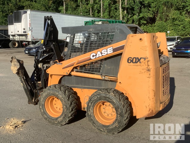 MINI CARGADOR SOBRE RUEDAS 2002 CASE 60XT