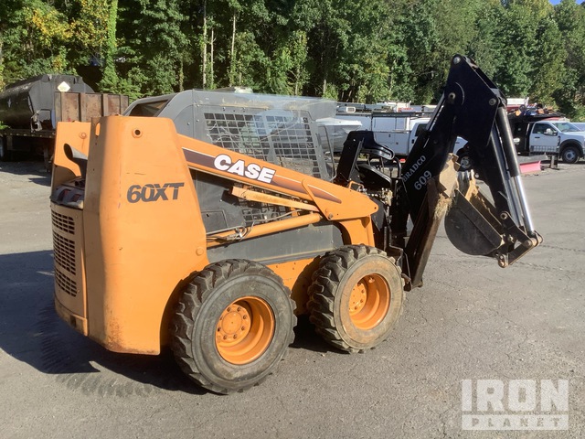 MINI CARGADOR SOBRE RUEDAS 2002 CASE 60XT