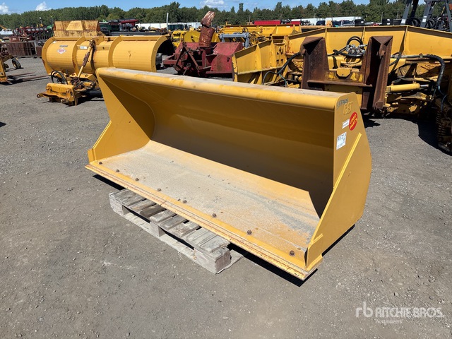 Cat 94 in Wheel Loader Bucket | Ritchie Bros. Auctioneers