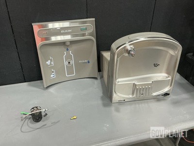 (26) Fuel Nozzles, (20) Nova Stoves, (1) Drinking Fountain & Assorted Items