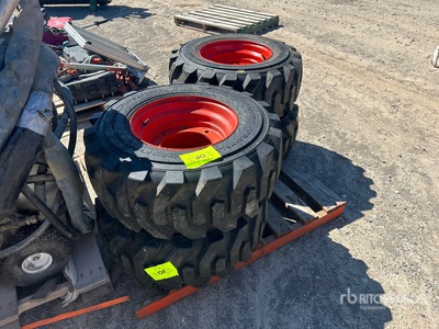 Quantity of (4) 12-16.5 NHS Équipements pour pneus (Unused) - Fits Skid Steer