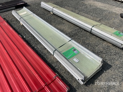 Quantity of (10) 12 ft x 18.5 in Clear Metal Lock Edge Polycarbonate Roof Panel (Unused)