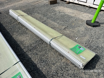 Quantity of (10) 12 ft x 18.5 in Clear Metal Lock Edge Polycarbonate Roof Panel (Unused)