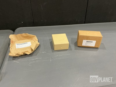 (16) Encased Seals, (7) Battery Adapters, (2) Resistors & Assorted Items