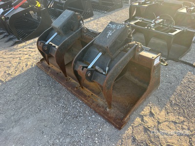 Cat 68 in Skid Steer Grapple Bucket