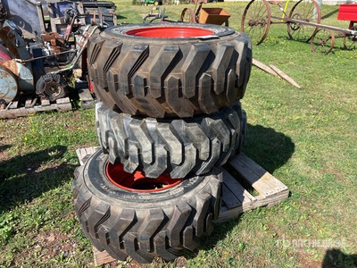 Quantity of (4) 12-16.5 Xtra-Wall Foam Filled Skid Steer Tires (Unused)