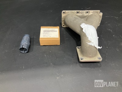 (1) Fluid Manifold, (1) Retainer Assembly & Assorted Items