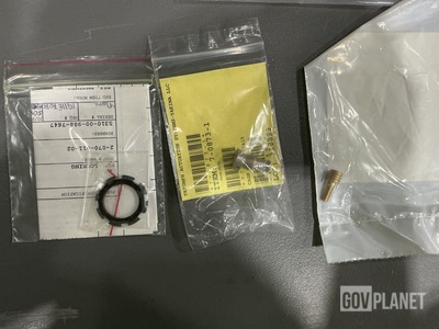 (1) Port Plug, (7) Round Plain Nuts, (18) Studs & Assorted Items