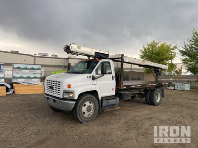 2006 Chevrolet C6500 4x2 Camion plataforma con transportador
