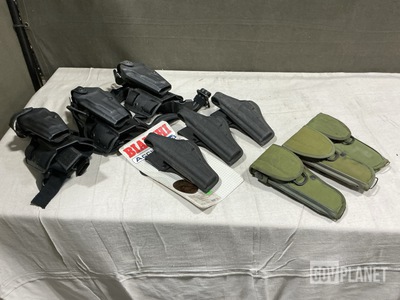 (30) Pistol Holsters, (14) Individual Holsters & Assorted Items