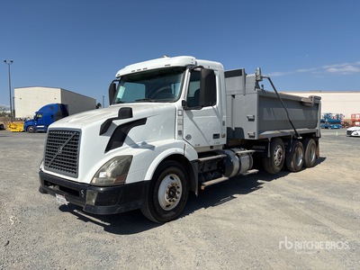 2012 Volvo VNL300 8x4 Tri/A Dump Truck