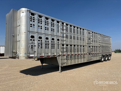 1999 Wilson 53 ft Tri/A Remolque para ganado