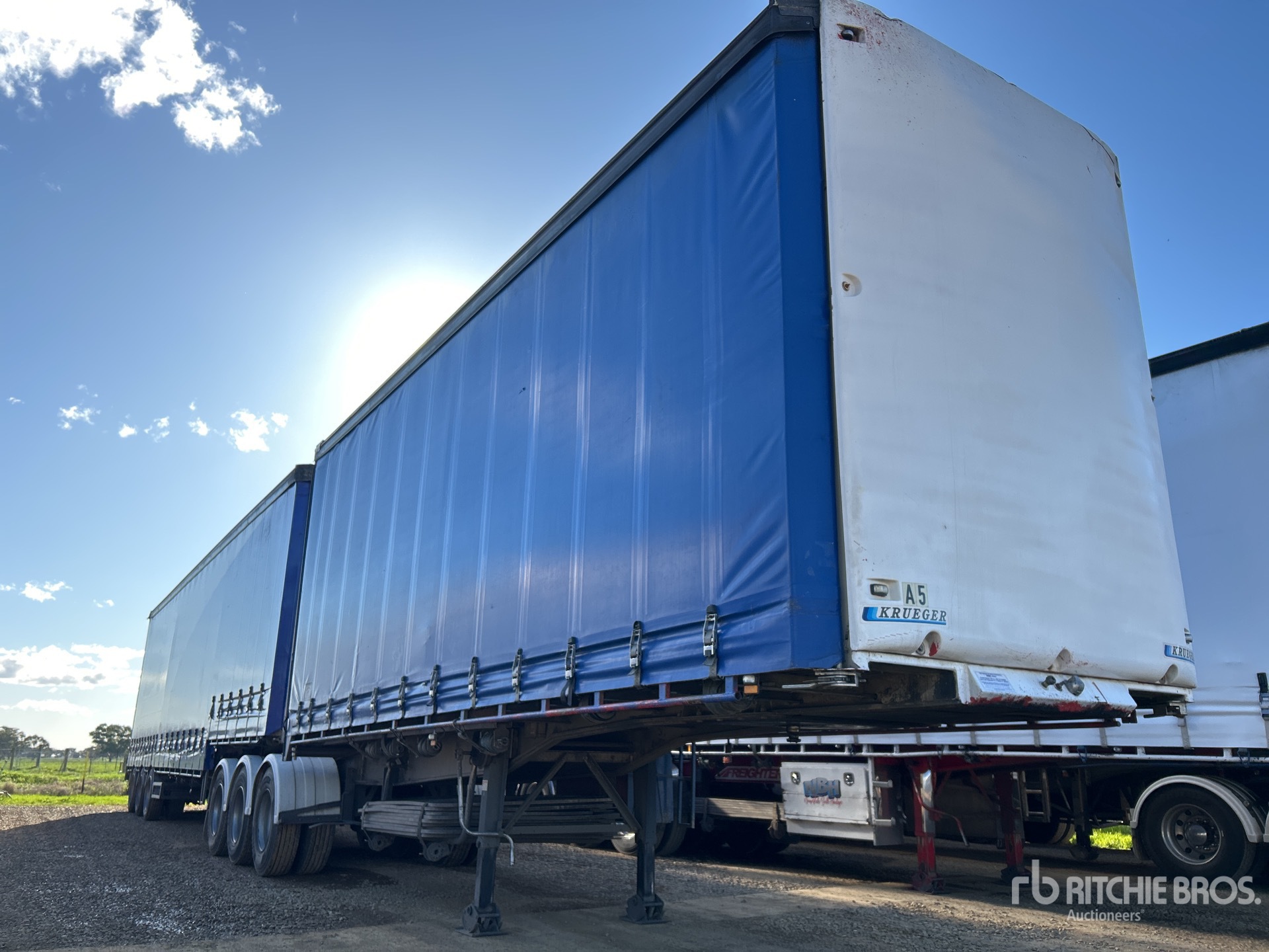 2006 Krueger 7.4 m Tri/A B-Double Lead Curtain Side Trailer