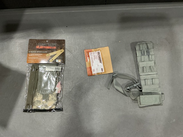 (26) Clips, (79) Holster Extenders, (13) Ammunition Pouches & Assorted Items