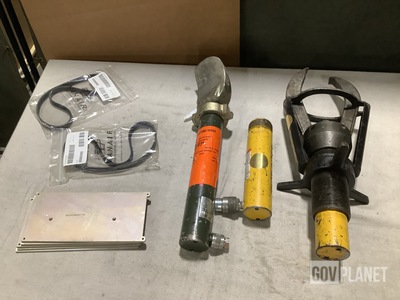 (29) V-Belts, (5) Mounting Plates, (1) Set of Rescue Tools & Assorted Items