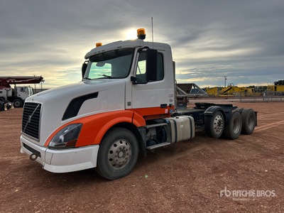 2015 Volvo VNL84T300 8x4 Tri/A Day Cab Truck Tractor