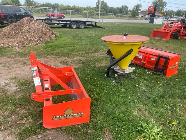 (1) Land Pride Spreader, (1) Box Blade and (1) Quick Hitch (1) Land Pride Spreader, (1) Box Blade and (1) Quick Hitch