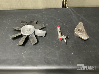 (1) Liquid Trap Assembly, (4) Fan Impellers, (1) Part Assembly & Assorted Items