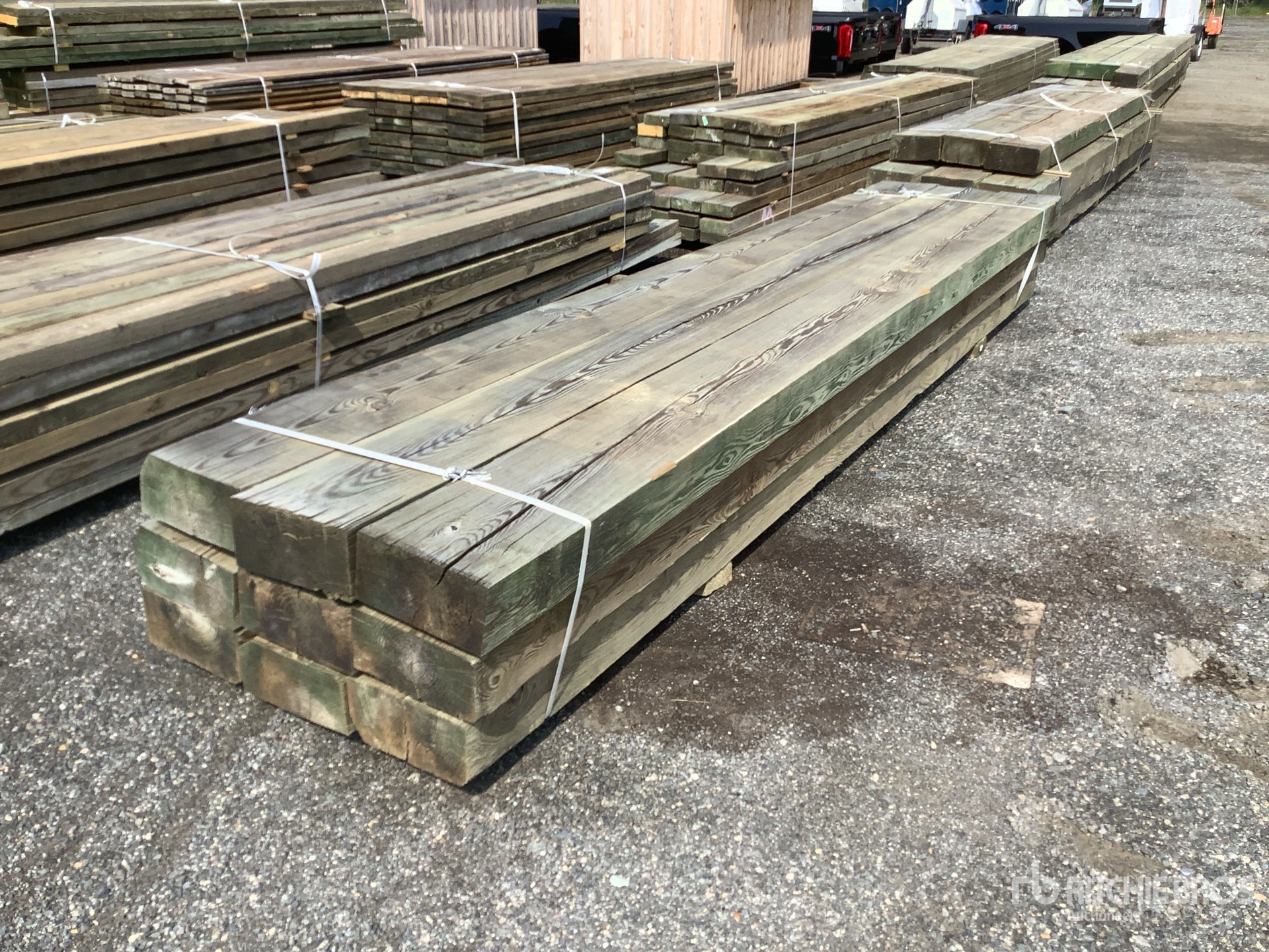 Quantity of (9) Surplus Pressure Treated Lumber