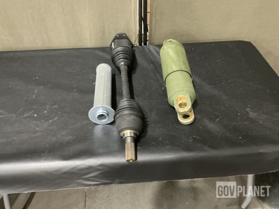 (8) Filter Elements, (1) Shock Absorber, (3) Axle Shafts & Assorted Items