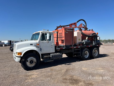 Ditch Witch FX65 on 2000 International 4900 6x2 Vacuum Excavator Truck