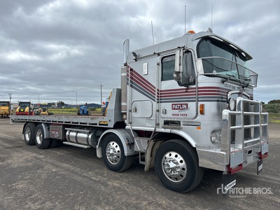 2003 Kenworth K104 8x4 Twin-Steer Sleeper Schiebeplateauschleppwagen
