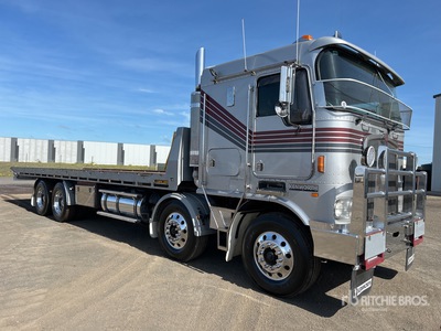 2003 Kenworth K104 8x4 Twin-Steer Sleeper Rollback Truck