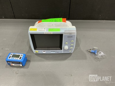 (1) Laparoscope Component, (1) Respiratory Monitor & Assorted Items