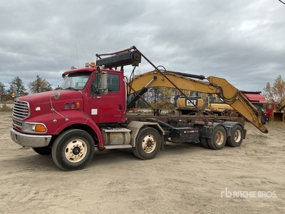 2001 Sterling LT9500 8x4 Twin-Steer Roll-Off Truck