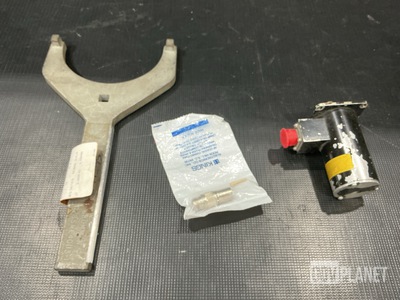 (1) Alternating Current Motor, (1) Wrench, (13) Plugs & Assorted Items