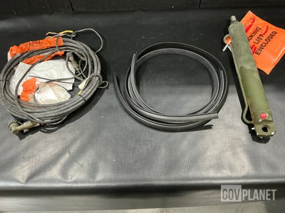 (2) Cylinder Assemblies, (4) Seals, (1) Cable Assembly & Assorted Items