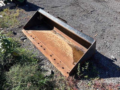 Cat 73 in Skid Steer Bucket