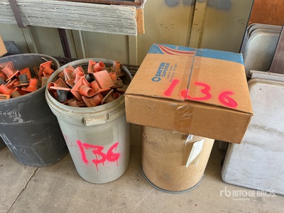 Quantity of (6) Barrels Of Used Square Head Rebar Caps