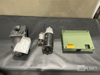 (1) Starter, (2) Accessories Stowage Boxes, (1) Pintle Hook & Assorted Items