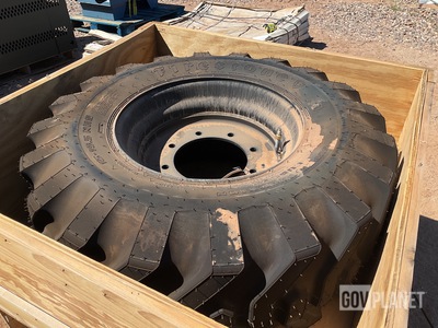 (2) Firestone 15-19.5 Tires w/Wheels